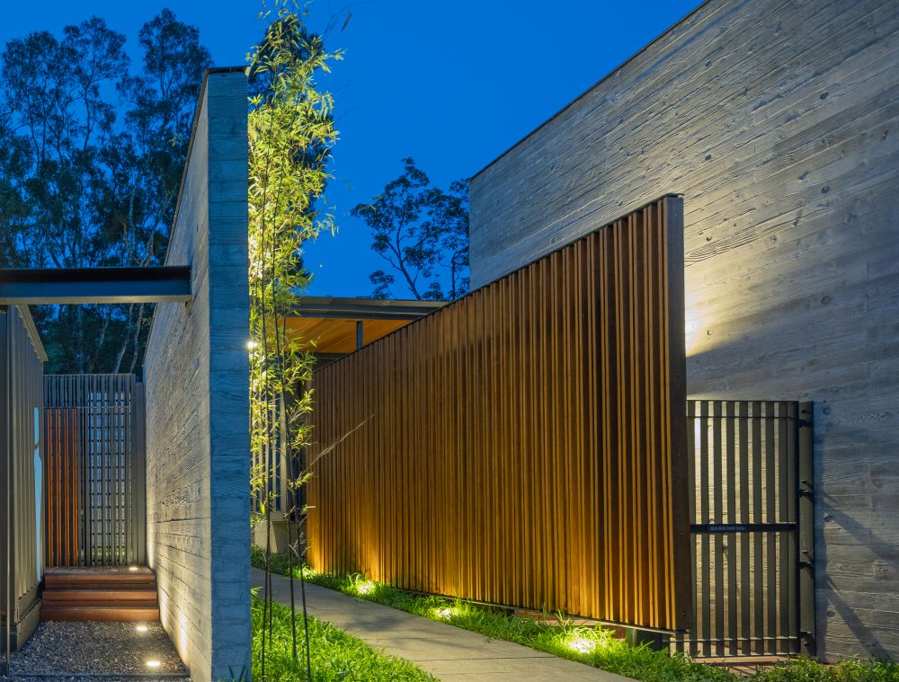 The team of architects uses wooden slats as screens to bring natural coolness to visitors.
