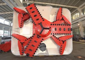 The pictured cutter head of the RTBM, weighing about 90 tonnes, is made up of a main cutter disk and four auxiliary cutter disks.