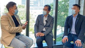 Will (left) and Michael (right) share with Mr Michael WONG (centre) the importance of life-long learning, encouraging young practitioners of the construction industry to work and further their studies at the same time.