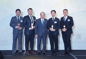 At the presentation ceremony of the first Construction Industry Outstanding Young Person Award (CIOYPA), Michael (second left) and Will (first right), and other outstanding young persons are pictured with the Chief Secretary for Administration, Mr CHEUNG Kin-chung, Matthew (centre).