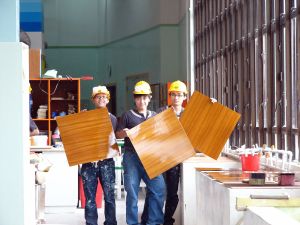 Will (centre) started off as an apprentice. He graduated from a painting course run by the CITA in 2008.