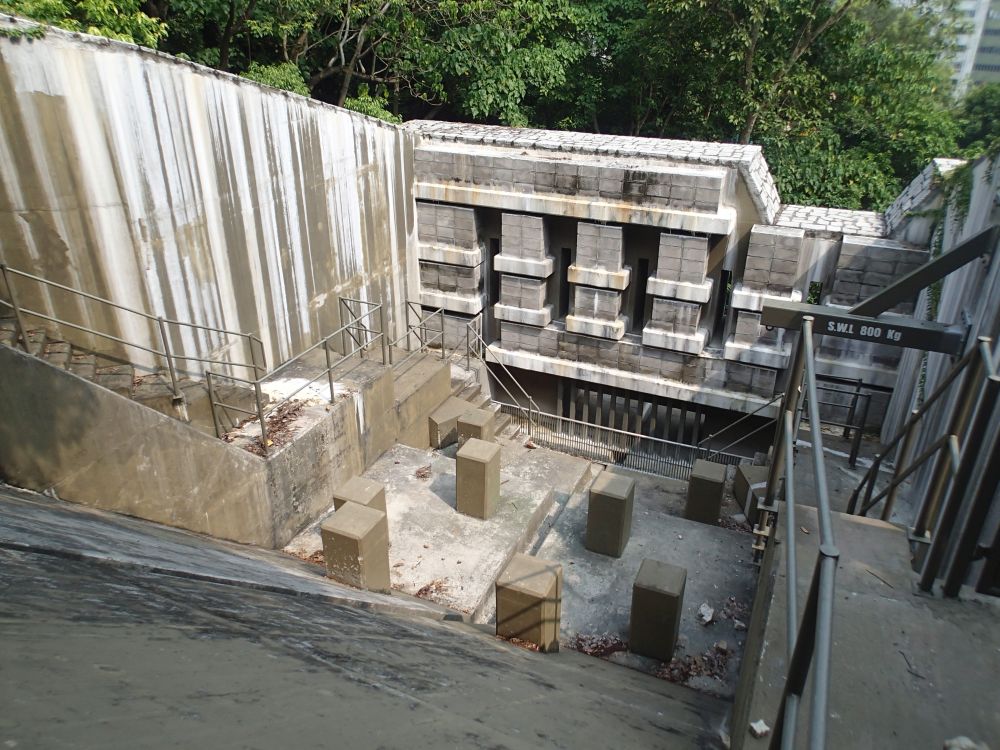 Landslide risk assessment with the use of a digital topographical model and geological data can help to reduce the project costs and time and impacts on the surrounding environment. Pictured is the rigid debris-resisting barrier at Shek Pai Wan.