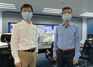 Mr CHUNG Wing-wah (left) and Mr YAN Chun-ho (right), Geotechnical Engineers of the Civil Engineering and Development Department (CEDD), explain how the project team utilises innovative technologies to enhance site management and operation efficiency, as well as to further enhance site safety.