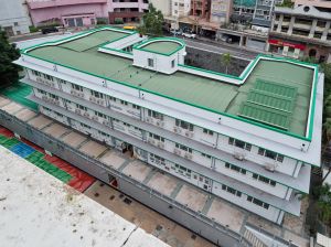 The Bonham Road Government Primary School is built on an E-shaped plan, comprising a long centre portion and a wing on each end.