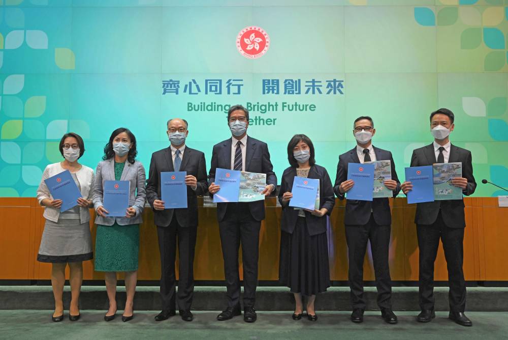 The Secretary for Development (SDEV), Mr Michael WONG, and the Secretary for Transport and Housing, Mr Frank CHAN, held a press conference earlier to elaborate on the initiatives in “The Chief Executive’s 2021 Policy Address” under their ambits. Pictured are (from left) the Permanent Secretary for Transport and Housing (Housing), Miss Agnes WONG; the Permanent Secretary for Transport and Housing (Transport), Ms Mable CHAN; Mr Frank CHAN; Mr Michael WONG; the Permanent Secretary for Development (Planning and Lands), Ms Bernadette LINN; the Permanent Secretary for Development (Works), Mr Ricky LAU; and the Director of Planning, Mr Ivan CHUNG, at the press conference.
