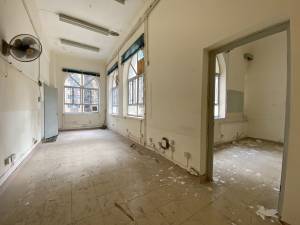 The Hong Kong Repertory Theatre has successfully obtained funding to pursue basic restoration works under the Funding Scheme to Support the Use of Vacant Government sites by NGOs implemented by the Development Bureau. Under the funding scheme, technical advice and support will be offered to facilitate smooth completion of the works. Pictured are the classroom and corridor of the Ex-Portuguese Community School (Escola Camões).