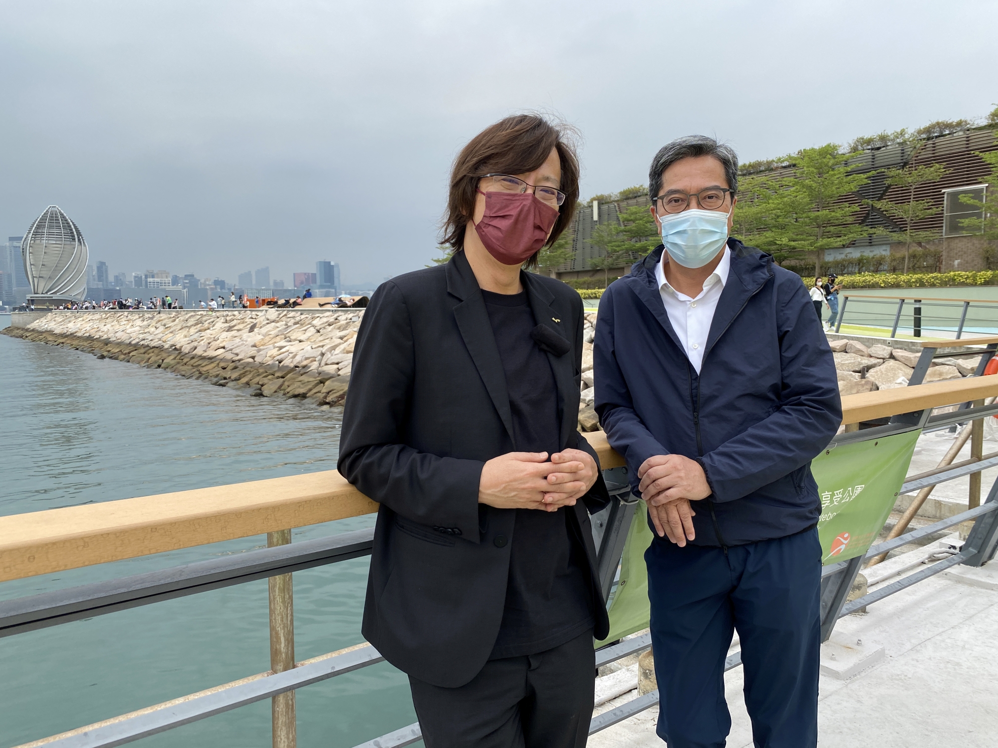 The Secretary for Development, Mr WONG Wai-lun, Michael (right), and the Chairman of the Harbourfront Commission (HC), Mr NG Wing-shun, Vincent (left), visit the East Coast Park Precinct (Phase 1) in Fortress Hill and talk about the introduction of fence-free designs to the harbourfront in detail.