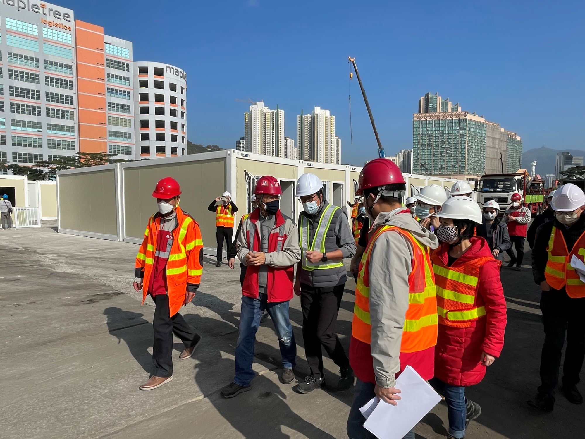 Yesterday, the Secretary for Development, Mr WONG Wai-lun, Michael, visited several sites for additional community isolation and treatment facilities with colleagues to know more about the work progress. Pictured is Tsing Yi Town Lot No. 200. 