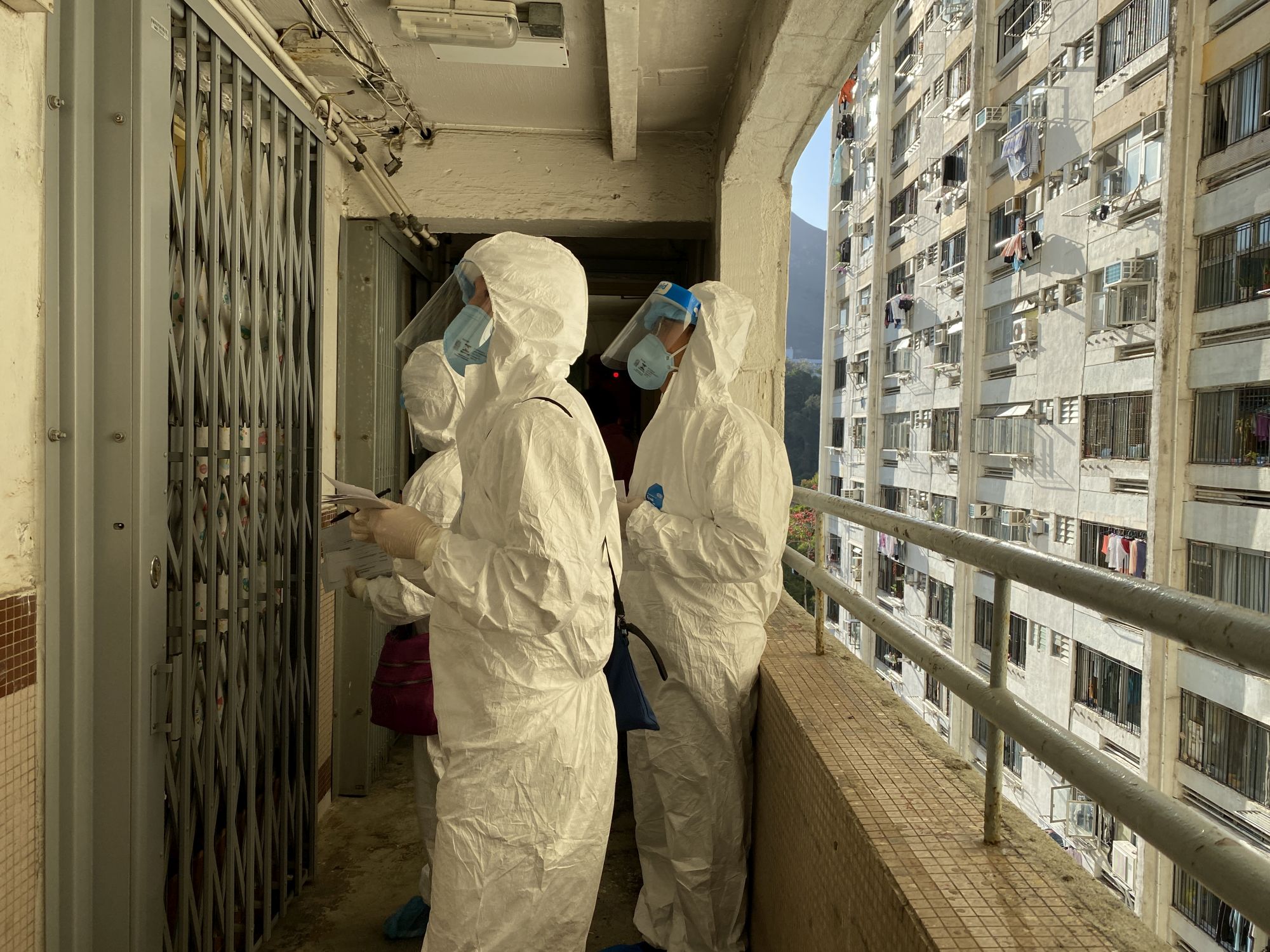 Colleagues took up various positions in the RTD operation, such as setting up the “restricted area”, going upstairs in small teams to remind residents to go downstairs to register and undergo testing, and handing out supplies to residents.
