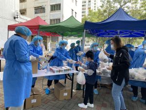 Colleagues took up various positions in the RTD operation, such as setting up the “restricted area”, going upstairs in small teams to remind residents to go downstairs to register and undergo testing, and handing out supplies to residents.