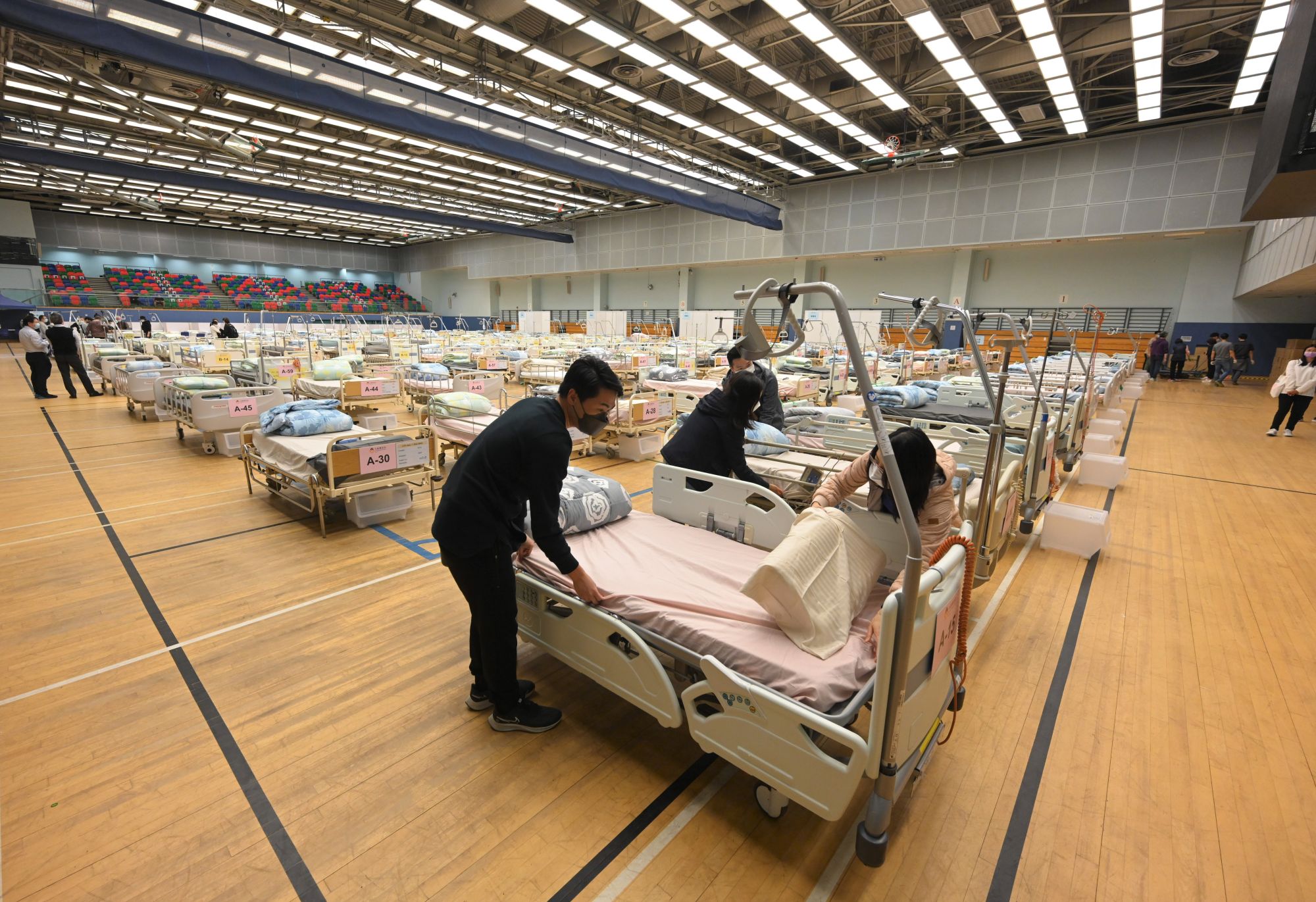 Since the onset of the fifth wave of epidemic, the Government has been tirelessly identifying venues to cope with the epidemic. Pictured is a holding centre for the elderly set up in a sport centre (stock photo).