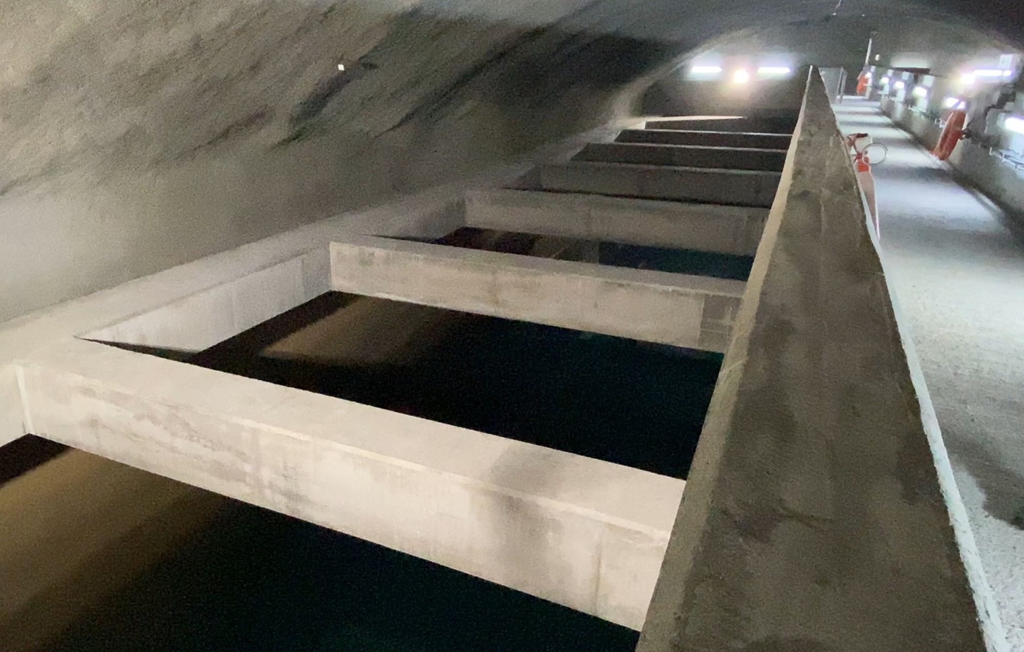 There are various government facilities accommodated inside caverns in Hong Kong, for example, the Stanley Sewage Treatment Works, Island West Transfer Station, and the Western Salt Water Service Reservoir in the picture.