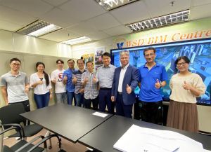 Senior Engineer (Building Information Modelling) of the Water Supplies Department (WSD), Mr WAN Wai-yin (third right), says that acting in the spirit of mutual trust and win-win co-operation advocated by the NEC, the project team holds meetings on a weekly basis and solve the problems with new thinking and new technologies.