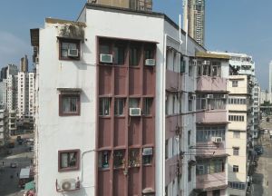 Pictured is the image of a building’s external walls taken by a drone.