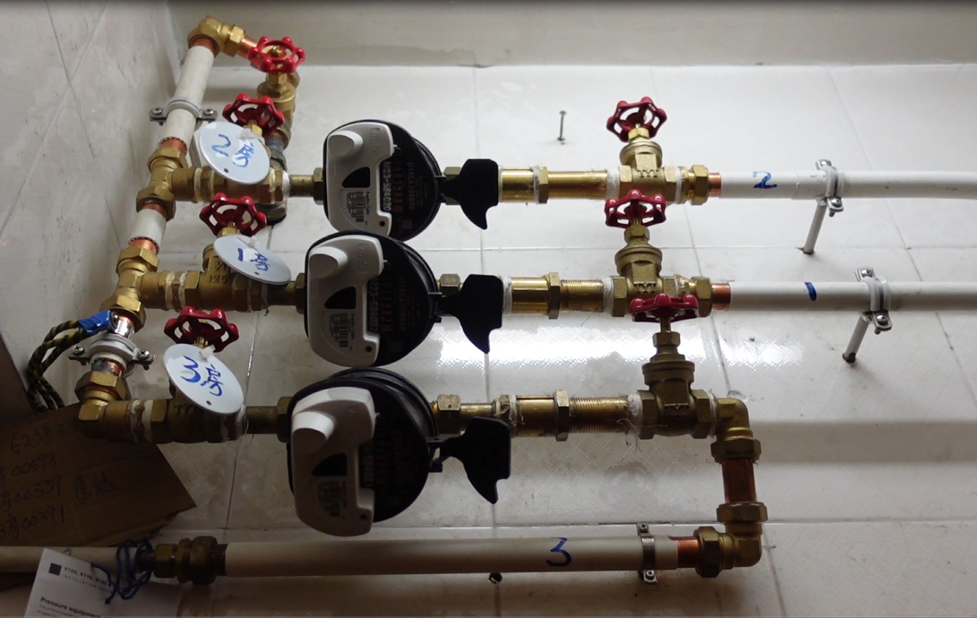 Picture shows the walk-by meters installed outside the residential units.