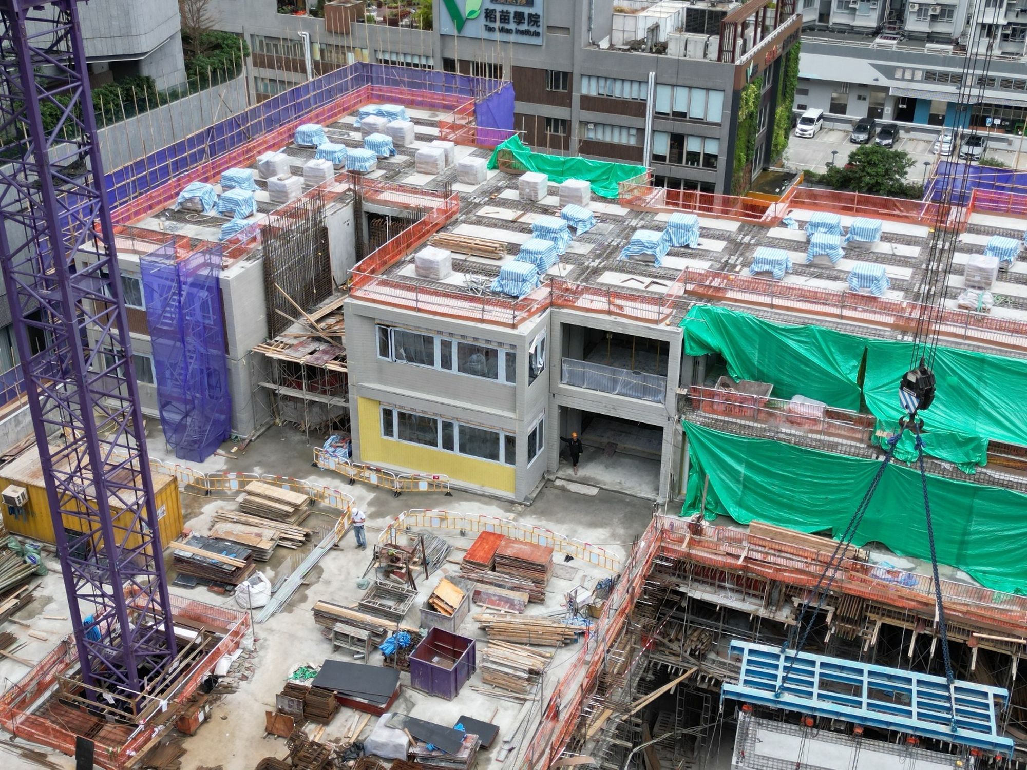 Currently, over 100 government and private projects have adopted MiC.  Picture shows a new primary school building constructed using MiC technology in Fo Tan, which has commenced operation earlier this year.