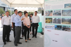 Chief Executive, Mrs Carrie LAM (front row, second left), looks at the exhibition panels while attending the opening ceremony of Kai San Road.