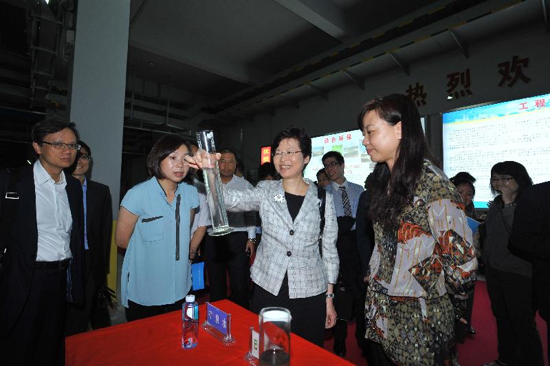 Mrs Lam (centre) visits the Buji Sewage Treatment Works after the meeting. The plant, put into operation in August last year, is the largest underground sewage treatment plant in China.