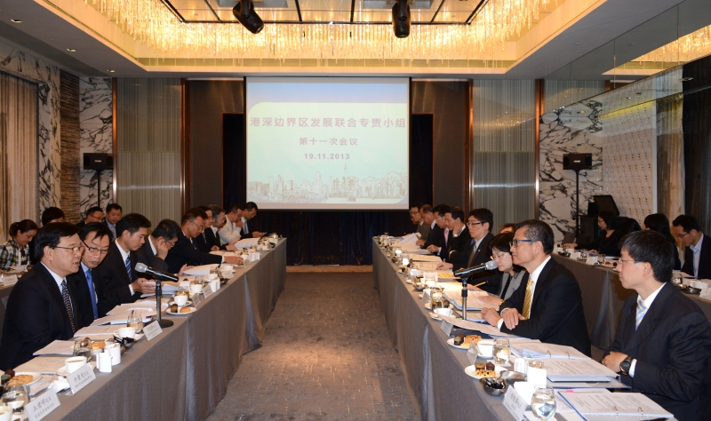 The Secretary for Development, Mr Paul Chan (second right), and the Executive Vice Mayor of the Shenzhen Municipal Government, Mr Lu Ruifeng (left), hold the 11th meeting of the Hong Kong-Shenzhen Joint Task Force on Boundary District Development in Hong Kong today (November 19)..