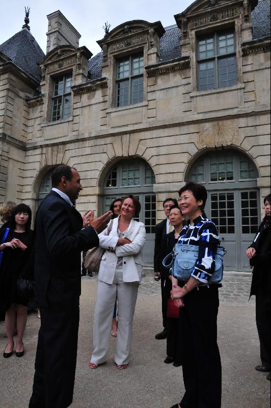 Mrs Lam is briefed on the restoration work in the Hotel de Sully. (Image)