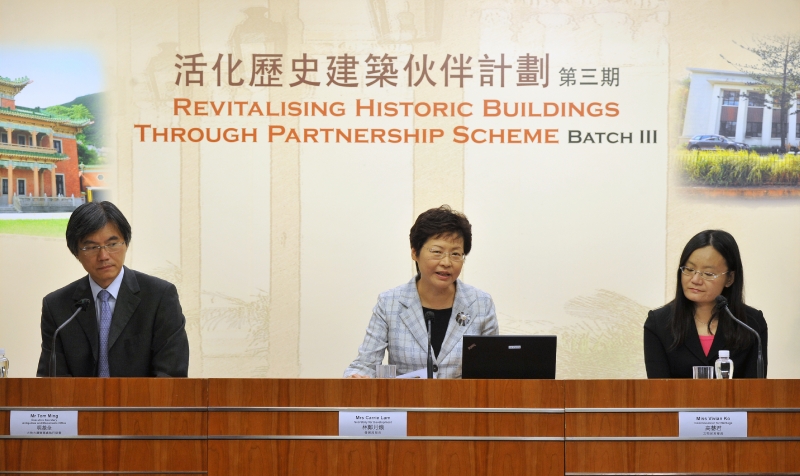 The Secretary for Development, Mrs Carrie Lam, announces details of Batch III of the Revitalising Historic Buildings Through Partnership Scheme today (October 7). Also present at the press conference are the Commissioner for Heritage, Miss Vivian Ko (right), and the Executive Secretary of the Antiquities and Monuments Office, Leisure and Cultural Services Department, Mr Tom Ming (left).