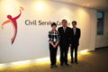 Accompanied by the Director of the Hong Kong Economic and Trade Office in Singapore, Mr Fong Ngai (right), and the Assistant Chief Executive Officer of the Civil Service College of Singapore, Mr Roger Tan (centre), Mrs Lam visits the Civil Service College of Singapore.