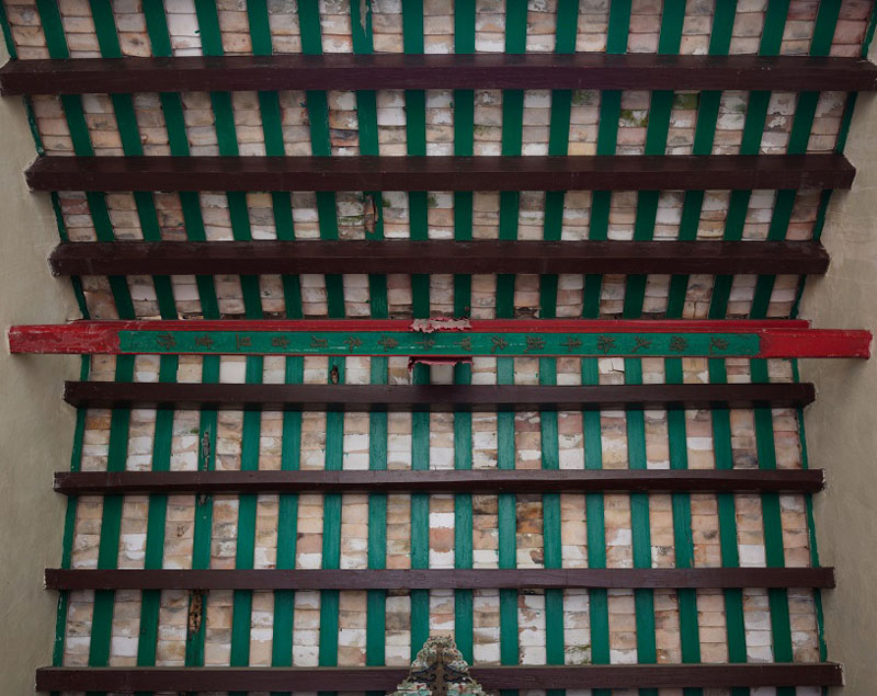 The Government today (July 16) gazetted a notice announcing that the Antiquities Authority (i.e. the Secretary for Development) has declared Bonham Road Government Primary School in Sai Ying Pun, the Old Tai Po Police Station in Tai Po and Hip Tin Temple in Sha Tau Kok as monuments under the Antiquities and Monuments Ordinance. Photo shows the original lantern beam inscribed with the year of rebuilding Hip Tin Temple, i.e. the 20th year of the Guangxu reign (1894). The Government today (July 16) gazetted a notice announcing that the Antiquities Authority (i.e. the Secretary for Development) has declared Bonham Road Government Primary School in Sai Ying Pun, the Old Tai Po Police Station in Tai Po and Hip Tin Temple in Sha Tau Kok as monuments under the Antiquities and Monuments Ordinance. Photo shows the original lantern beam inscribed with the year of rebuilding Hip Tin Temple, i.e. the 20th year of the Guangxu reign (1894).