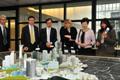 Mrs Lam (second right) is briefed on the latest development of the La Défense business district.