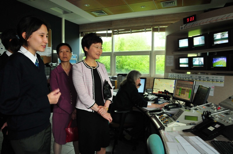 Mrs Lam (second right) visits the control room of Paris' tramway service.