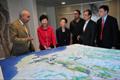 The Secretary for Development, Mrs Carrie Lam (second left), is briefed on the planning and development of Eco Valley.