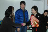 Mrs Lam receives a souvenir from parents of students of Heep Hong Society (Wan Chai Centre).   