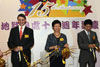 The Secretary for Development, Mrs Carrie Lam (centre); Permanent Secretary for Development (Planning and Lands), Mr Raymond Young (right); and Land Registrar, Mr Kim Salkeld, officiate at a ribbon-cutting ceremony to kick off an exhibition at Queensway Government Offices today (October 27) to mark the Land Registry's 15th anniversary.