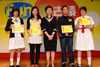 The Secretary for Development, Mrs Carrie Lam, presents award to the winners of the Historic Buildings Drawing Competition today (April 18).