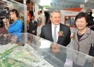 Mrs Carrie Lam is briefed on the Kai Tak Development while touring the Hong Kong Pavilion at MIPIM Asia 2010. The Hong Kong Pavilion features three main themes: Kai Tak Development, heritage conservation and urban renewal.