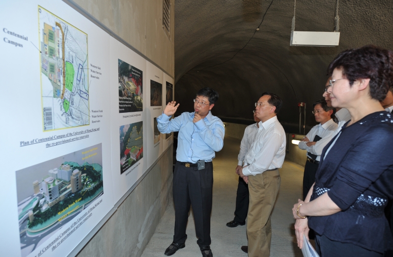 Mr Tsang is briefed on a project to relocate service reservoirs at Pok Fu Lam in a cavern and release the land for the University of Hong Kong's Centennial Campus.