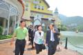 Mrs Lam (centre) tours the OCT East Resort after the meeting.