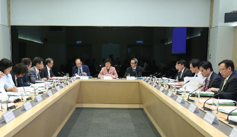 The Task Force on Land Supply holds its first meeting today (September 6). The Chief Executive, Mrs Carrie Lam (centre), attends part of the meeting. Looking on are the Chairman and Vice-chairman of the Task Force on Land Supply, Mr Stanley Wong (right) and Dr Greg Wong (left).