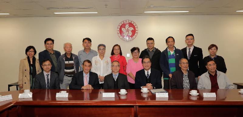 The Secretary for Home Affairs, Mr Lau Kong-wah, and the Secretary for Development, Mr Michael Wong, visited Islands District today (December 7). Photo shows Mr Lau (front row, third left) and Mr Wong (front row, third right) with the Chairman of the Islands District Council, Mr Chow Yuk-tong (front row, second left); the District Officer (Islands), Mr Anthony Li (front row, first left); and members of the Islands District Council.