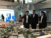 The Secretary for Development, Mr Michael Wong, continued his visit to Singapore today (January 14). Picture shows Mr Wong (second right), accompanied by the Minister for National Development, Mr Lawrence Wong (third right), and the Chief Executive Officer of the Urban Redevelopment Authority, Mr Lim Eng Hwee (first right), touring the Singapore City Gallery.