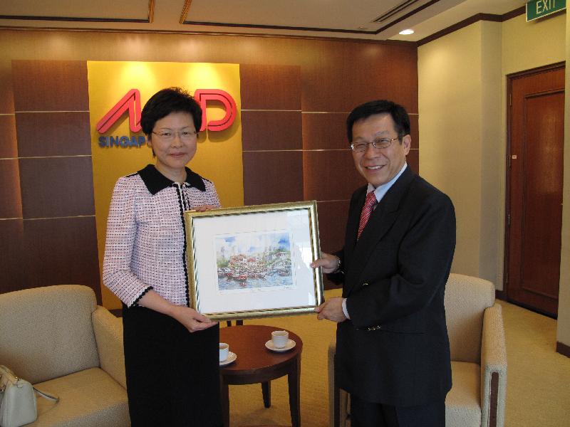 The Secretary for Development, Mrs Carrie Lam, meets with the Minister for National Development of Singapore, Mr Mah Bow Tan.he tunnel boring machine launching ceremony of Hong Kong West Drainage Tunnel project today (March 6).