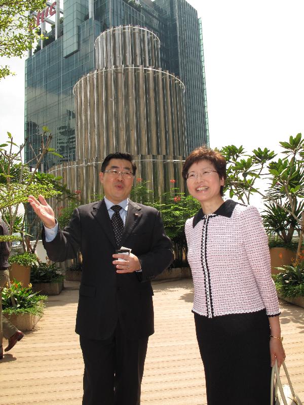 The Secretary for Development, Mrs Carrie Lam, visits the former Asia Insurance Building.