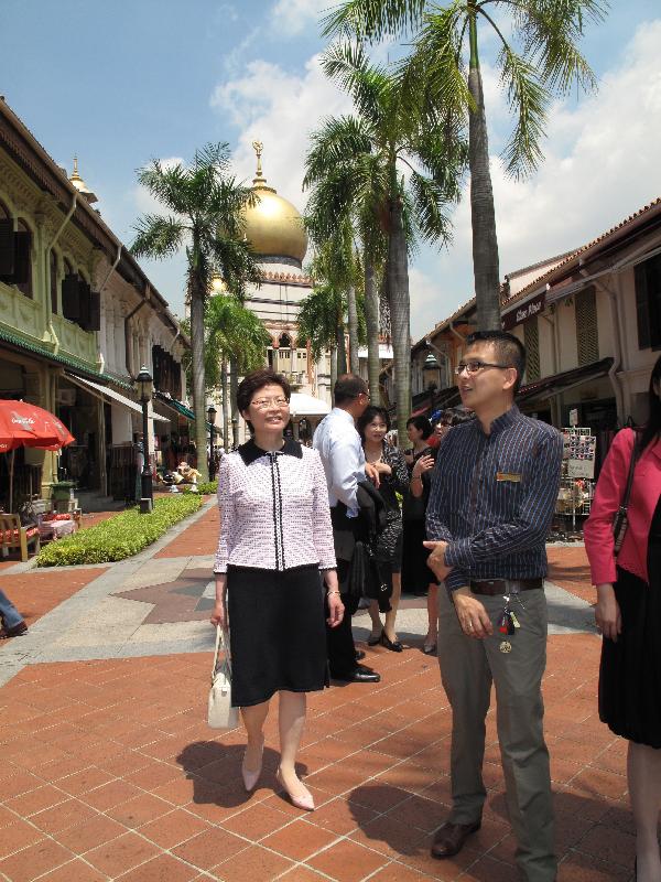 The Secretary for Development, Mrs Carrie Lam, visits the Kampong Glam Historic District.