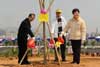 The Secretary for Development, Mrs Carrie Lam (right), planting a tree at a Community Planting Day ceremony in Shui Chuen O, Sha Tin, today (March 14) with the Director of Civil Engineering and Development, Mr Chai Sung-veng (left) and Chairman of Sha Tin District Council, Mr Wai Kwok-hung.