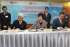The Secretary for Development, Mrs Carrie Lam (centre), signs the Memoranda of Understanding on "Operation Building Bright" with the Chairman of Hong Kong Housing Society, Mr Yeung Ka-sing (left), and the Chairman of the Urban Renewal Authority, Mr Barry Cheung, to mark the launch of the scheme, which aims to create more jobs.