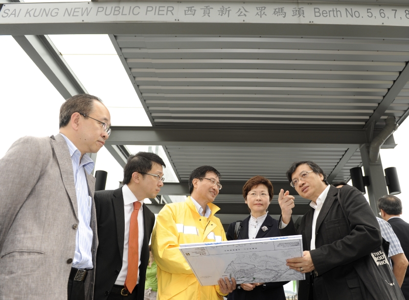 The Secretary for Development, Mrs Carrie Lam, receives a briefing on the planned developments in Sai Kung Town.