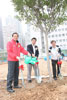 Director of Drainage Services, Mr Lau Ka-keung (centre), planting a tree at a planting ceremony at the Stormwater Pumping Station in Sheung Wan today (March 28) with Legislative Council member and Central and Western District Council member, Mr Kam Nai-wai (left) and Chairman of Central and Western District Council, Mr Chan Tak-chor.
