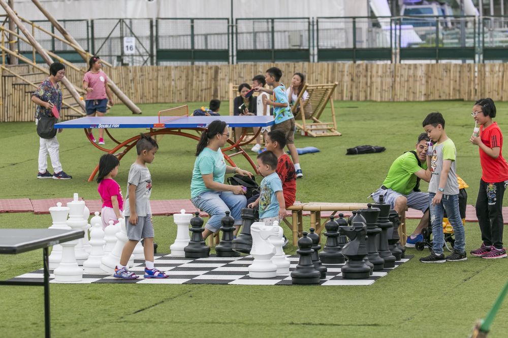 Marquees, deck chairs and amenity facilities are provided in the open space for public enjoyment.