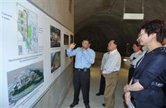 Mr Tsang is briefed on a project to relocate service reservoirs at Pok Fu Lam in a cavern and release the land for the University of Hong Kong's Centennial Campus. 