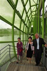 Mrs Lam (centre) visits the Docks en Seine, where innovative renovation work is under way to convert this industrial establishment into a centre devoted to fashion and design.