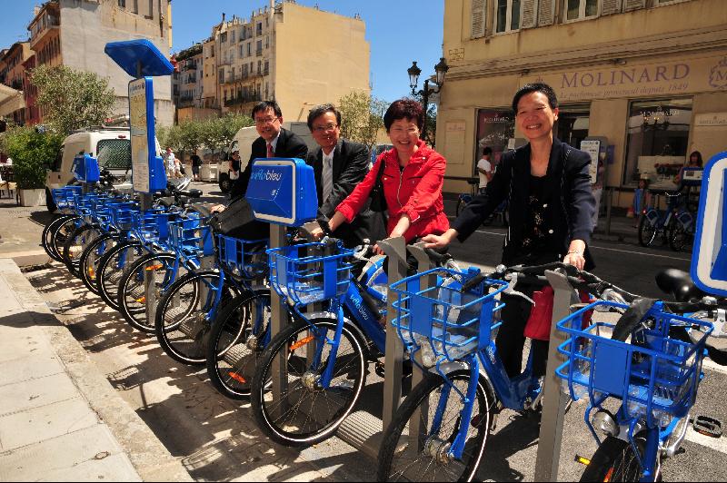 Mrs Lam is attracted by the distinctive blue bicycles under Nice's bicycle-sharing programme.